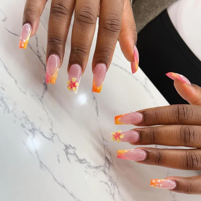 Sunshine mixed with a little flower power 🌸☀️
 Book now at :  https://gemmanailsspa.ca
and enjoy our 20% off for grand opening 
#tropicalnails
#sunsetnails
#floralnails
#orangetips
#ombrenails