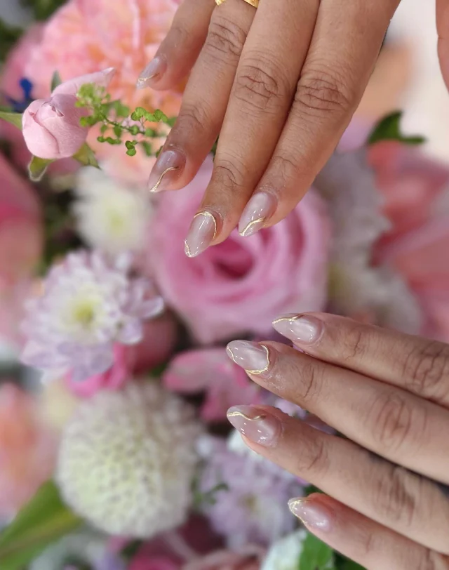 Blush tones & golden lines — simple perfection ✨

Book now at: https://gemmanailsspa.ca 
Enjoying 20% off for first visits end of this month 

#nailart #naildesign #nails #gelnails #nailinspo