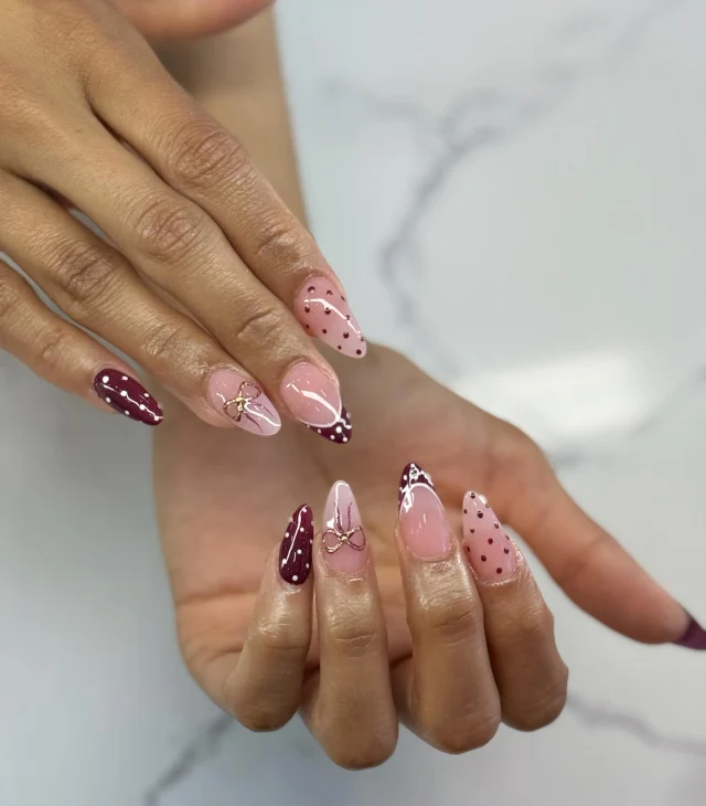Polka dots and pretty bows 🎀

Book now at: https://gemmanailsspa.ca

#NailInspo #NailArt #BurgundyNails #PinkNails #BowNails