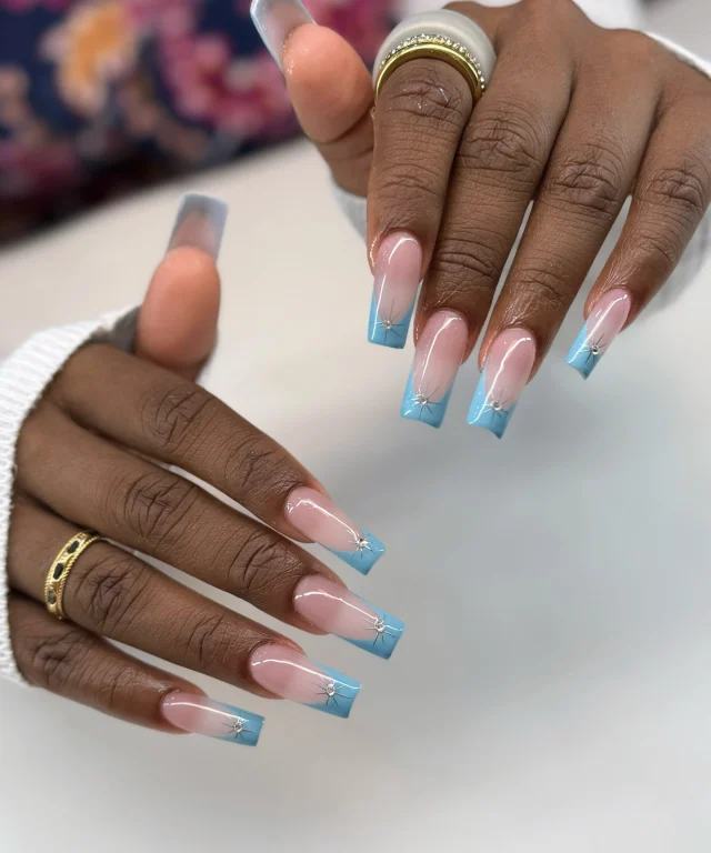 Clean lines, icy blue French tips, and a touch of sparkle. Obsessed! ✨💙

Book now at: https://gemmanailsspa.ca

#nailsinspo 
#missisauganailsalon
#summernailsinspo 
#nailart 
#bluenails