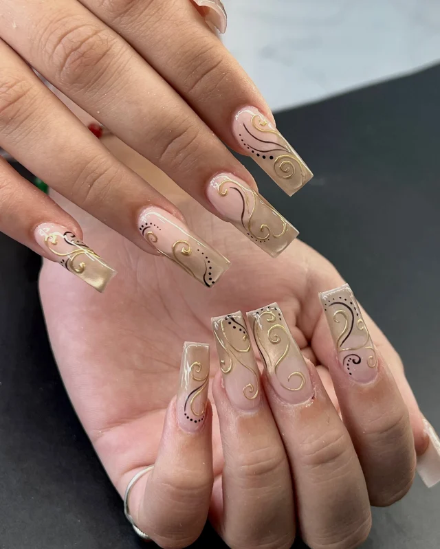 Elegance in every swirl. ✨

Book now at: https://gemmanailsspa.ca

#NailArt #GoldNails #NudeNails #ElegantNails